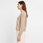 Beige mock-neck — side view